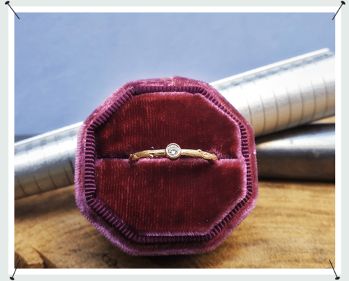 Yellow golden engagement ring 'Orchard' . A twig ring with a 0,10 crt diamond. Oogst Amsterdam.