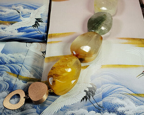 Rutiel kwarts armband met roodgouden kei sluiting. Rutile quartz bracelet with rose gold rock clasp. Oogst goudsmid Amsterdam