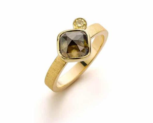 Gouden verlovingsring ton sur ton diamant. Oogst goudsmeden Amsterdam.