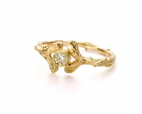 Gouden verlovingsring blaadjes en diamant. Oogst goudsmeden Amsterdam.