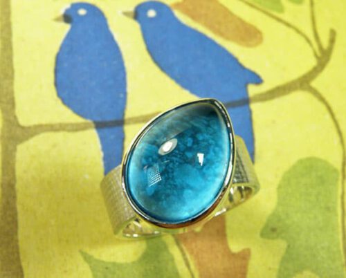 Assieraad. Zilveren ring Linnen met topaas. Silver ring Linen with a topaz. Commemorative jewel. Oogst goudsmid Amsterdam