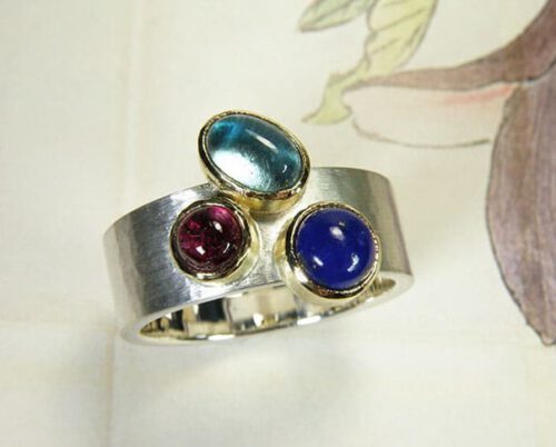 Assieraad. Ring zilver met Lapis Toermalijn Topaas. Commemorative jewel. Silver ring with topaz, tourmaline and lapis. Commemorative jewel. Oogst goudsmid Amsterdam