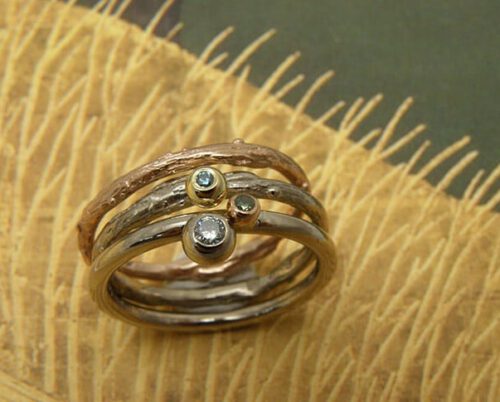 Aanschuifringen in witgoud en roodgoud. Geboortesieraad. Baargoud. Stack rings rin white gold and rose gold. Birth present. Push present. Oogst goudsmid Amsterdam