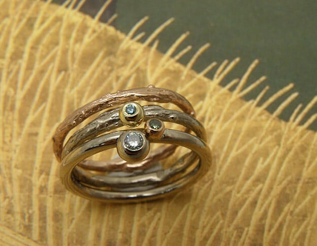 Aanschuifringen in witgoud en roodgoud. Geboortesieraad. Baargoud. Stack rings rin white gold and rose gold. Birth present. Push present. Oogst goudsmid Amsterdam