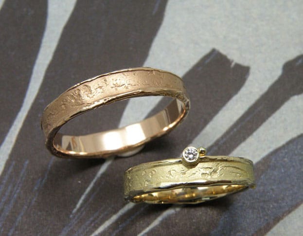 Handmade wedding bands Erosion. Yellow gold ring with diamond. Rose gold textured ring. Wedding rings. Design by goldsmith Oogst in Amsterdam.  Blog about the Oogst craftswomanship.