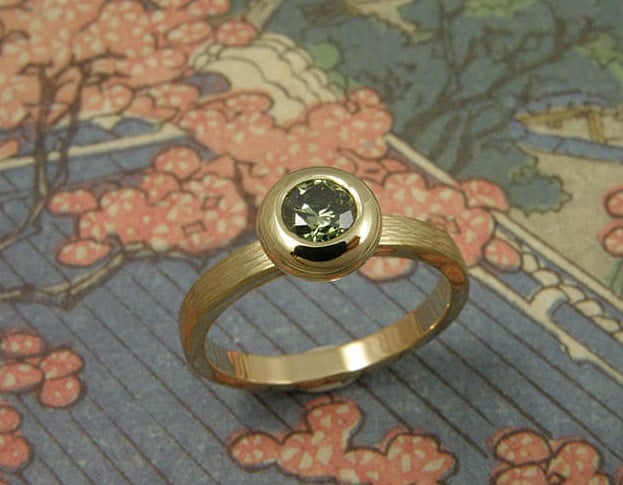 Engagement ring Boletus yellow gold ring with hammering and fancy green diamond. Oogst goldsmith Amsterdam