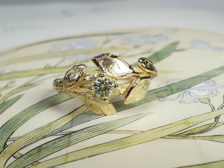 Rose gold Orchard engagement ring with a 0,23 ct cape diamond. Design by Oogst goldsmith in Amsterdam