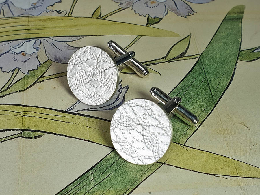 Zilveren manchetknopen met stof patroon, Silver cufflinks with pattern. oogst goudsmid Amsterdam