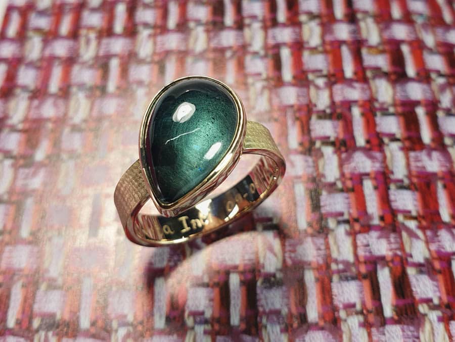 Push present. Birth gift. Yellow gold ring Linen with Topaz drop shaped. Oogst goldsmith Amsterdam.