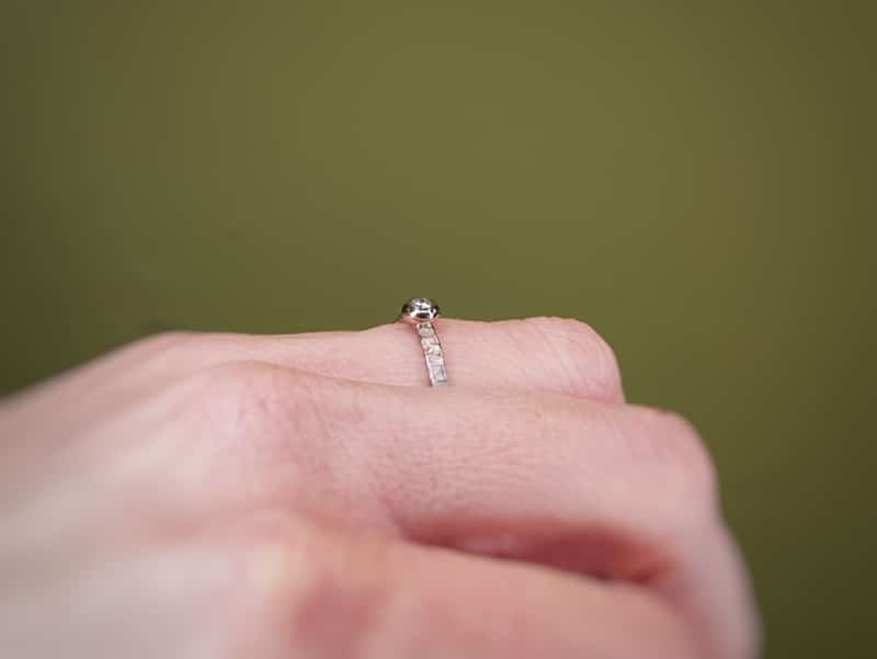 Engagement ring 'Swell'. White golden ring with texture and 0,10 ct diamond. Made at Oogst studio.