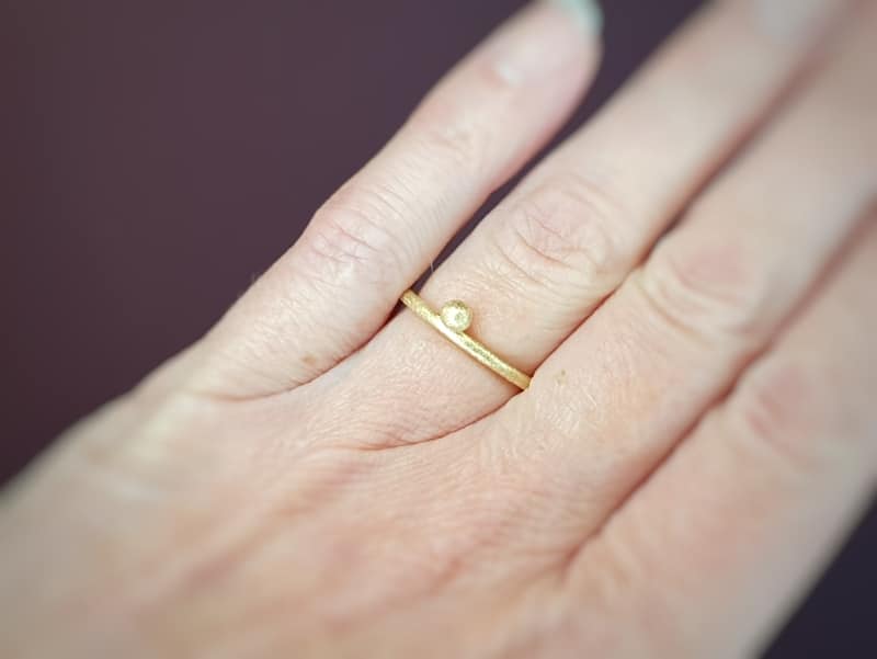 Stack rings 'berries' in yellow gold and rose gold. design by goldsmith Oogst.
