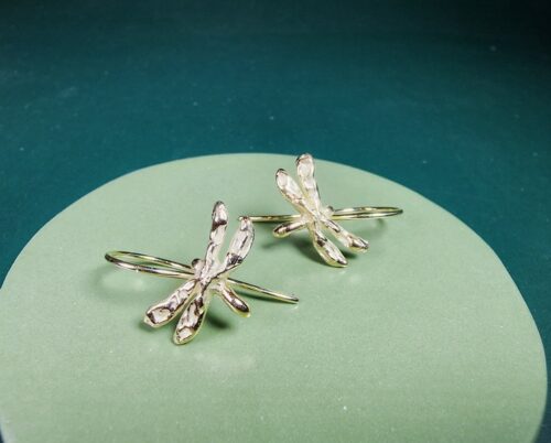 Yellow gold earrings 'Insects'. Playful and timeless 'Dragonfly' on a hook. Jewellery design by Oogst goldsmith in Amsterdam
