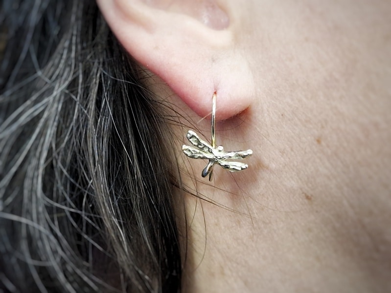 Yellow gold earrings 'Insects'. Playful and timeless 'Dragonfly' on a hook. Jewellery design by Oogst goldsmith in Amsterdam