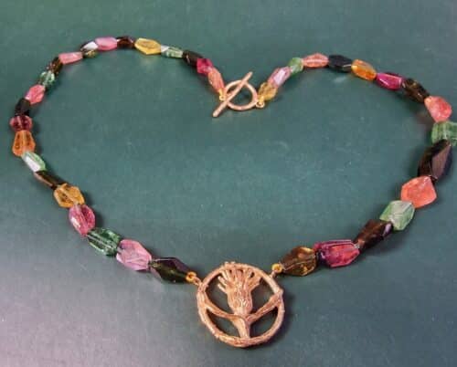 Tourmaline necklace with rosé gold 'Thistle'. Designed by Oogst goldsmith Amsterdam.