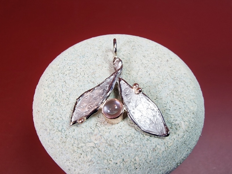 White gold 'Leaves' pendant with pink moonstone. Elegant design by Oogst Jewellery in Amsterdam