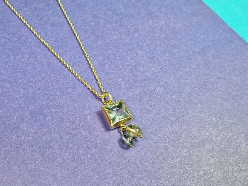 Yellow gold pendant with prasiolite and sapphire, from the Square series. Birth stone of September. Oogst Original.